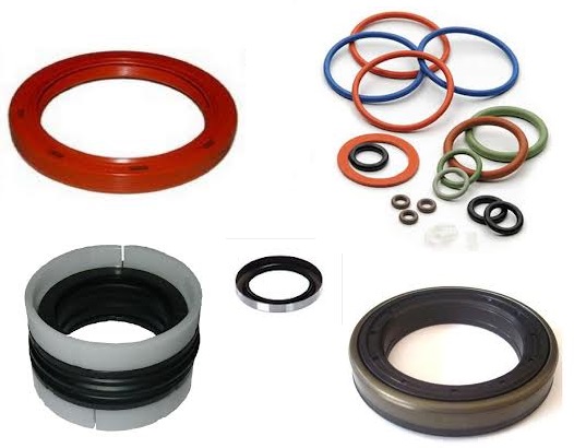 Obraz jest ucieleśnieniem kompleksowej oferty w dziedzinie precyzyjnych uszczelnień technicznych. Kompozycja łączy w sobie sterylny, techniczny wizerunek r&oacute;żnorodnych typ&oacute;w uszczelnień z profesjonalizmem i dostępnością, jakie budzi autoryzowany polski dystrybutor DAKAM. Dominują w niej profesjonalne barwy &ndash; głęboka czerń (NBR), brąz (Viton), stal oraz akcenty kolorystyczne (np. niebieski poliuretan). W centrum uwagi, na czystej, industrialnej powierzchni (np. metalowym stole lub białym tle), znajduje się starannie zaaranżowany zestaw reprezentatywnych uszczelnień technicznych: &bull;	Simmering (Uszczelniacz promieniowy wału): Kluczowy element &ndash; precyzyjnie wykonany simmering (np. z czarnej gumy NBR lub brązowej FPM/Viton) z widoczną metalową obudową i sprężynką dociskającą wargę. &bull;	O-ringi: Niewielka grupa lub kaskada idealnie gładkich O-ring&oacute;w w r&oacute;żnych rozmiarach. &bull;	Uszczelnienie hydrauliczne: Precyzyjny, turkusowy lub niebieski pierścień uszczelniający (np. tłokowy lub dławnicowy z poliuretanu), kt&oacute;ry dodaje kompozycji koloru i podkreśla dostępność specjalistycznych rozwiązań. &bull;	Uszczelka płaska: Precyzyjnie wycięta uszczelka kołnierzowa (np. z płyty Gambit, Klingerit lub PTFE), co wizualnie komunikuje zdolność do dostarczania gotowych uszczelek. &bull;	(Opcjonalnie) Pakiet uszczelnień typu V-Ring lub sznur do uszczelnień mechanicznych. Wszystkie elementy emanują jakością wykonania i precyzją. Tło jest subtelnie rozmyte (efekt bokeh), ale jednoznacznie wskazuje na profesjonalną dystrybucję na terenie Polski: &bull;	Nowoczesny magazyn DAKAM: W tle widać rzędy wysokich regał&oacute;w magazynowych. W przeciwieństwie do palet, regały są wypełnione tysiącami małych, posegregowanych pudełek i pojemnik&oacute;w magazynowych (KLT), co wizualnie komunikuje ogromną dostępność i szeroki asortyment drobnych komponent&oacute;w. &bull;	Logo Dystrybutora: W dyskretnym, ale widocznym miejscu umieszczone jest logo DAKAM, z dopiskiem "Centrum Uszczelnień Technicznych" lub "Autoryzowany Dystrybutor". Obraz niesie jasny komunikat: "Jako sprawdzony polski dystrybutor DAKAM, posiadamy na stanie pełen asortyment uszczelnień technicznych &ndash; simmeringi, o-ringi, uszczelnienia hydrauliczne, płyty i gotowe uszczelki &ndash; dostępnych od ręki".