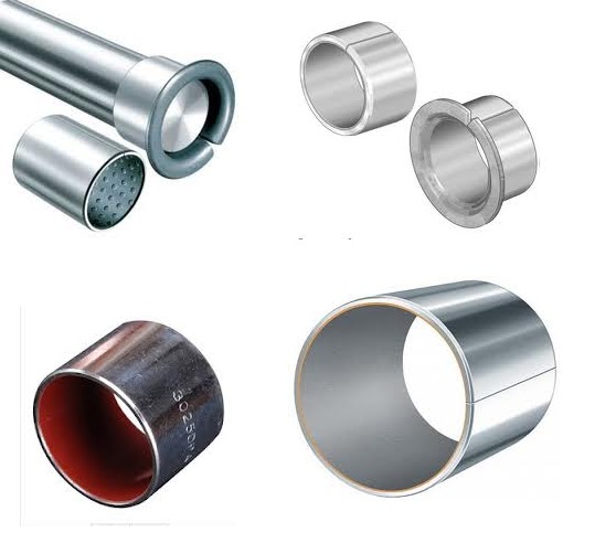 Tulejki Ślizgowe, Tulejki Samosmarne i Panewki &ndash; Przewodnik po Świecie Łożysk Ślizgowych Opis zdjęcia: Zdjęcie prezentuje szeroki asortyment kluczowych komponent&oacute;w mechanicznych: tulejki ślizgowe, tulejki samosmarne oraz panewki ślizgowe. Elementy ułożone są na neutralnym tle, co pozwala dokładnie przyjrzeć się r&oacute;żnicom w ich budowie, materiale wykonania i wykończeniu. Widzimy tu zar&oacute;wno klasyczne, jednolite tuleje z brązu o złotawym połysku, nowoczesne tuleje polimerowe, jak i precyzyjne, dwudzielne panewki stalowo-kompozytowe. R&oacute;żnorodność form &ndash; od prostych cylindr&oacute;w po tuleje kołnierzowe i p&oacute;łpierścienie &ndash; doskonale ilustruje szerokie zastosowanie tych części w przemyśle.  1. Tulejki Ślizgowe &ndash; Niezawodna Podstawa Tulejki ślizgowe, często nazywane po prostu łożyskami ślizgowymi, to podstawowy i wszechstronny typ łożyska. Na zdjęciu widoczne są jako:  Tuleje z brązu lub stali: Charakteryzują się jednolitą, metaliczną strukturą. Wymagają regularnego smarowania za pomocą oleju lub smaru stałego, aby zminimalizować tarcie i zużycie.  Tuleje zwijane (Permaglide, Glycodur): Wykonane z taśmy stalowej pokrytej warstwą ślizgową (np. brąz spiekany z PTFE). Rozpoznawalne po charakterystycznym wzdłużnym nacięciu. Łączą wysoką wytrzymałość mechaniczną z dobrymi właściwościami ślizgowymi.  2. Tulejki Samosmarne &ndash; Technologia Bezobsługowa Grupa ta stanowi nowoczesne rozwiązanie problemu smarowania. Tuleje samosmarne (nazywane też łożyskami bezobsługowymi lub suchoślizgowymi) zawierają smar w swojej strukturze, co eliminuje potrzebę zewnętrznego smarowania. Na zdjęciu można wyr&oacute;żnić:  Tuleje ze spiek&oacute;w brązu (np. Bimet, Brąz Spiekany): Posiadają porowatą strukturę nasączoną olejem, kt&oacute;ry jest uwalniany podczas pracy. Mają matowy, miedziany wygląd.  Tuleje z wkładkami grafitowymi: W litej tulei (najczęściej z brązu) osadzone są korki z grafitu, kt&oacute;ry pełni funkcję smaru stałego. Idealne do pracy w wysokich temperaturach i przy niskich prędkościach.  Tuleje polimerowe (np. z iglidur&reg;, teflonu): Wykonane w całości z zaawansowanych tworzyw sztucznych z dodatkami smarującymi. Są lekkie, odporne na korozję i chemikalia, a także doskonale tłumią drgania.  3. Panewki Ślizgowe &ndash; Precyzja w Najtrudniejszych Warunkach Panewki ślizgowe to specjalistyczny typ łożyska, najczęściej stosowany w silnikach spalinowych do osadzania wał&oacute;w korbowych i korbowod&oacute;w. Ich kluczowe cechy to:  Konstrukcja dwudzielna: Składają się z dw&oacute;ch precyzyjnych poł&oacute;wek (p&oacute;łpanewek), co umożliwia montaż na złożonych wałach.  Budowa wielowarstwowa: Zazwyczaj składają się ze stalowego płaszcza nośnego pokrytego specjalnym stopem łożyskowym, kt&oacute;ry zapewnia niskie tarcie i odporność na zatarcia.  Zastosowanie: Kluczowe dla motoryzacji (panewki gł&oacute;wne, panewki korbowodowe) oraz w ciężkich maszynach przemysłowych.